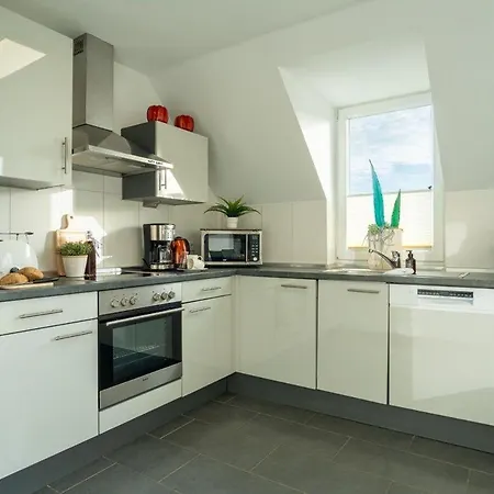 Апартаменты Strandpark-grossenbrode-haus-windrose-wohnung-13